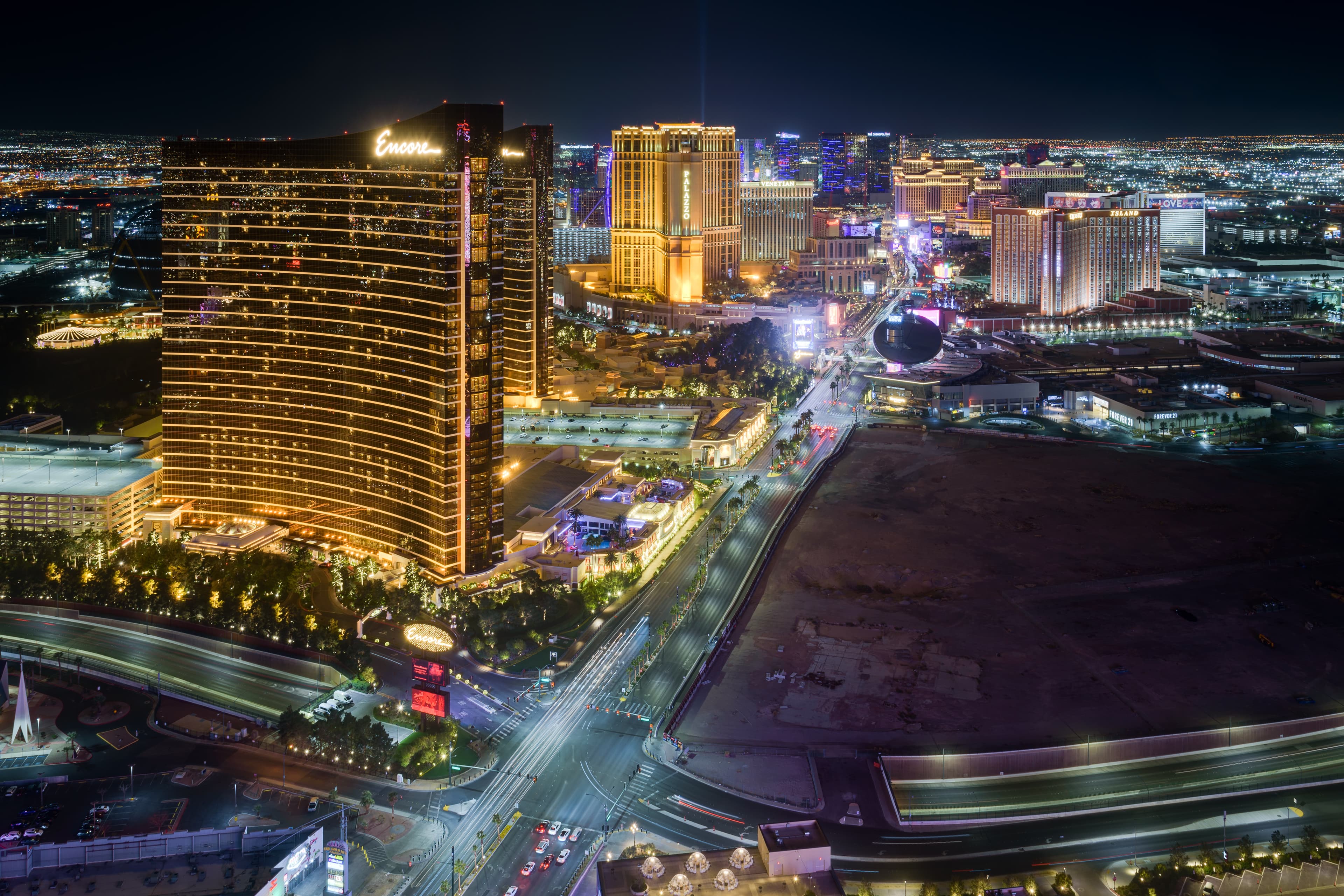 Illuminated hotels and roadway on the Las Vegas Strip at night