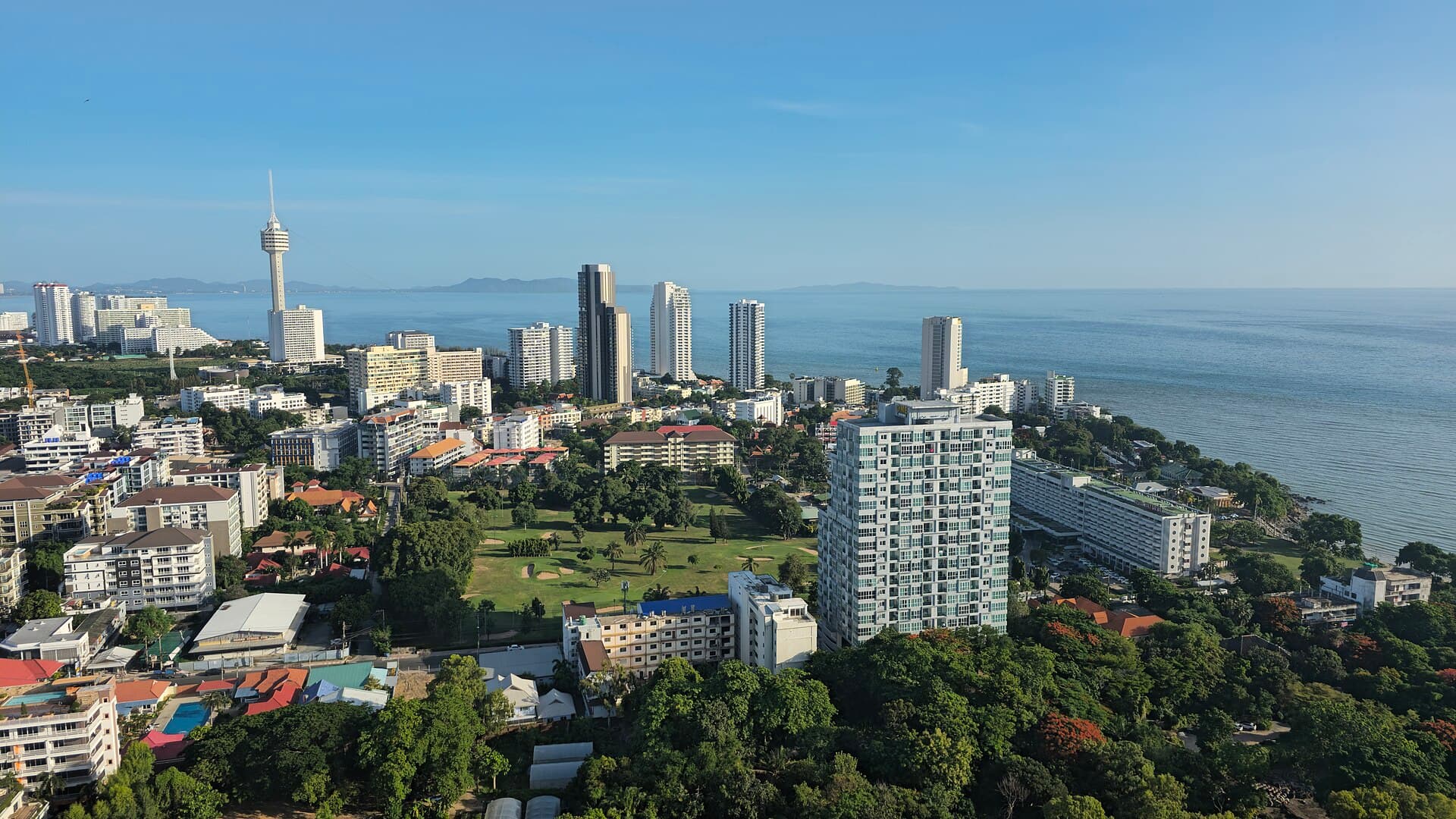 Aerial view along Jomtien Beach and its seafront buildings beside the Gulf of Thailand.
