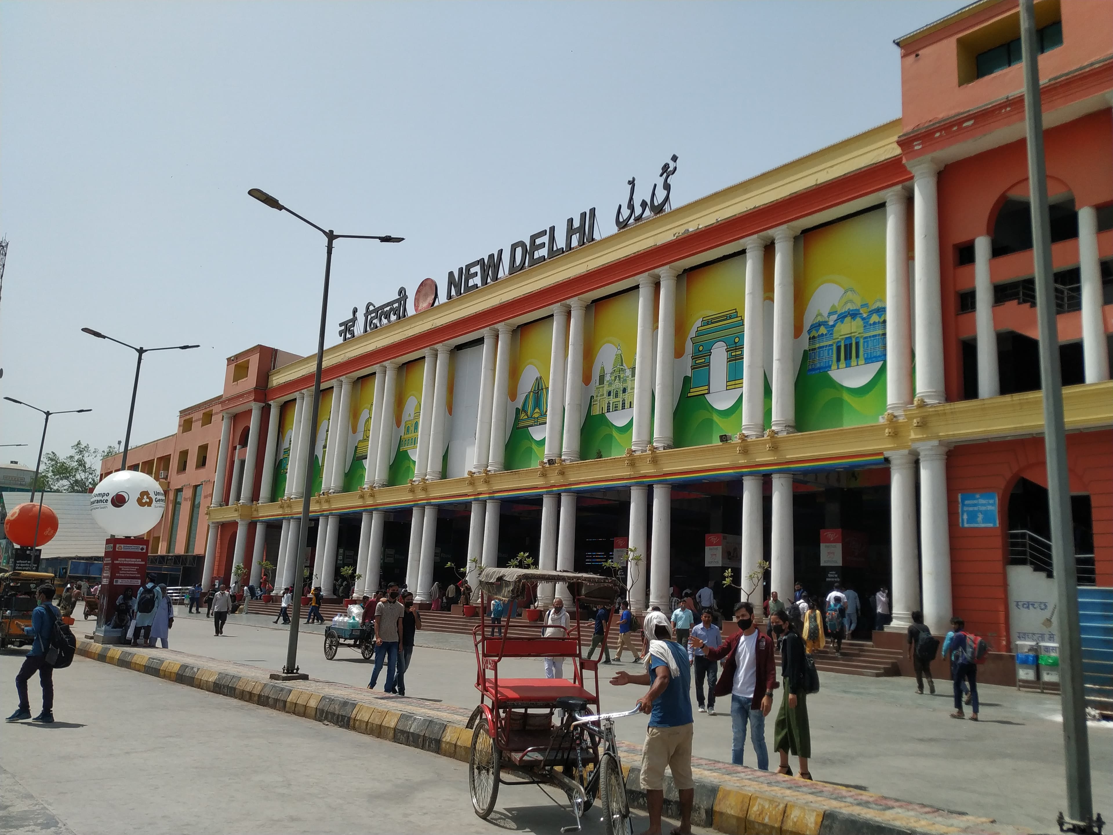 Colourful facade of New Delhi railway station on the Ajmeri Gate side, with the New Delhi sign