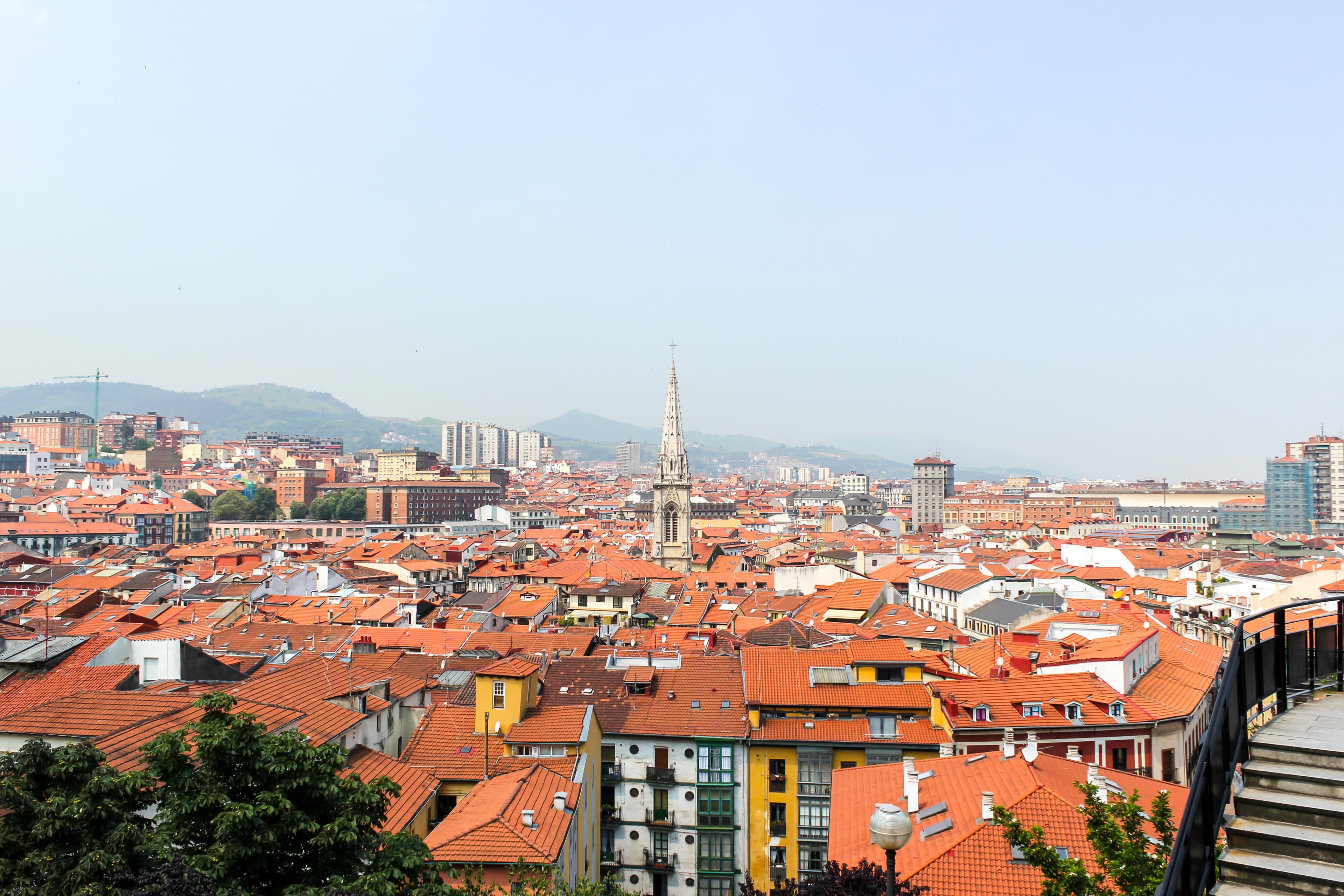 Colourful Casco Viejo rooftops and the cathedral in Bilbao