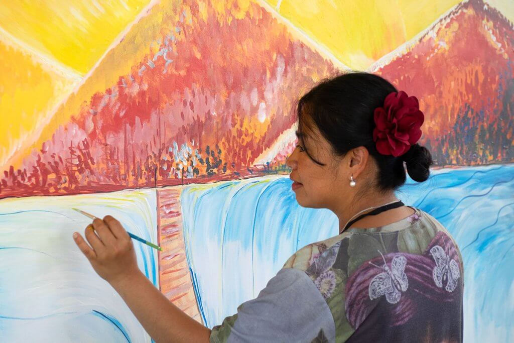 Evelyn Morán Cojoc’s Maya Mural Honors the Gifts of Grandmother Earth at Smithsonian Festival